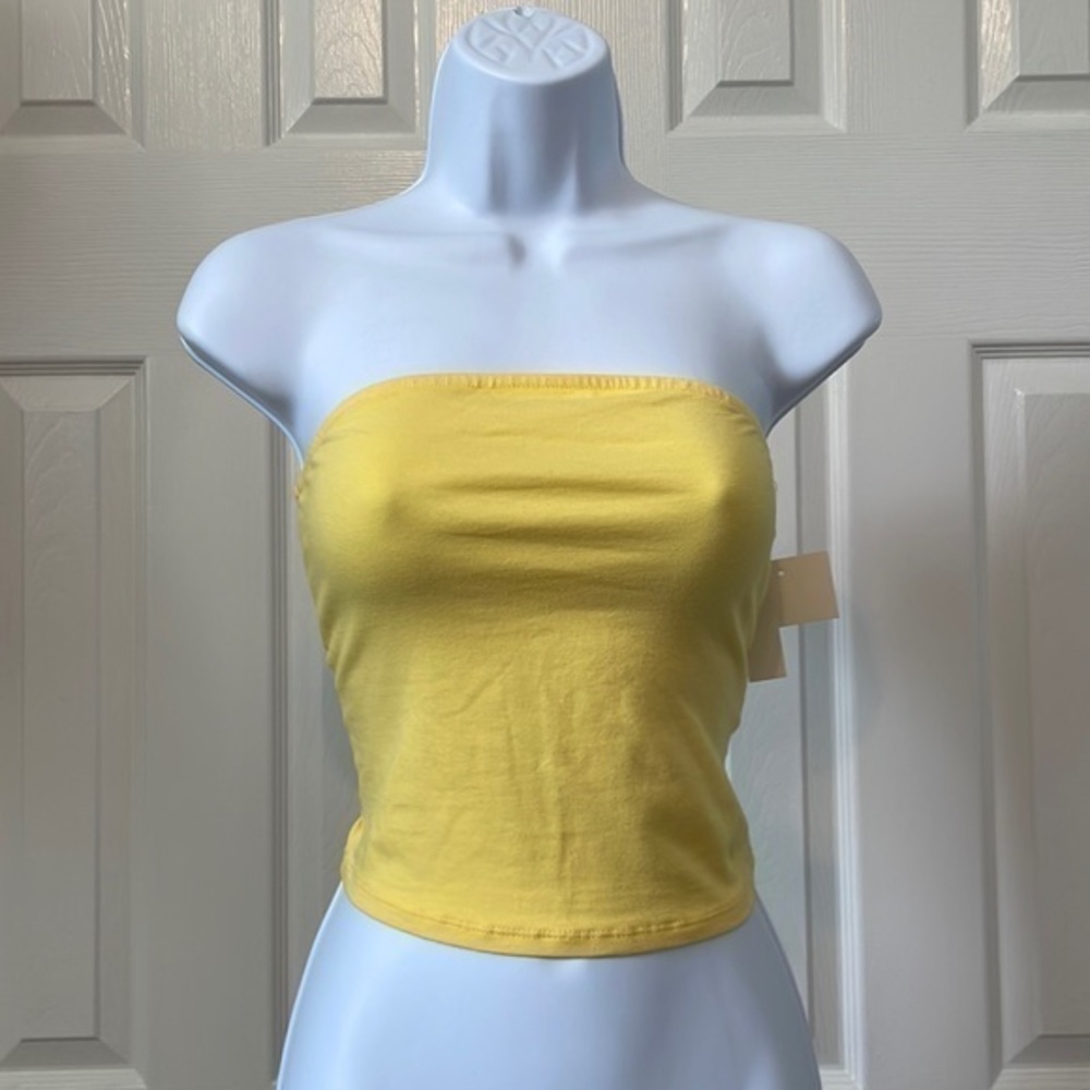 NWT yellow tube top with elastic around the top to keep from slipping down.